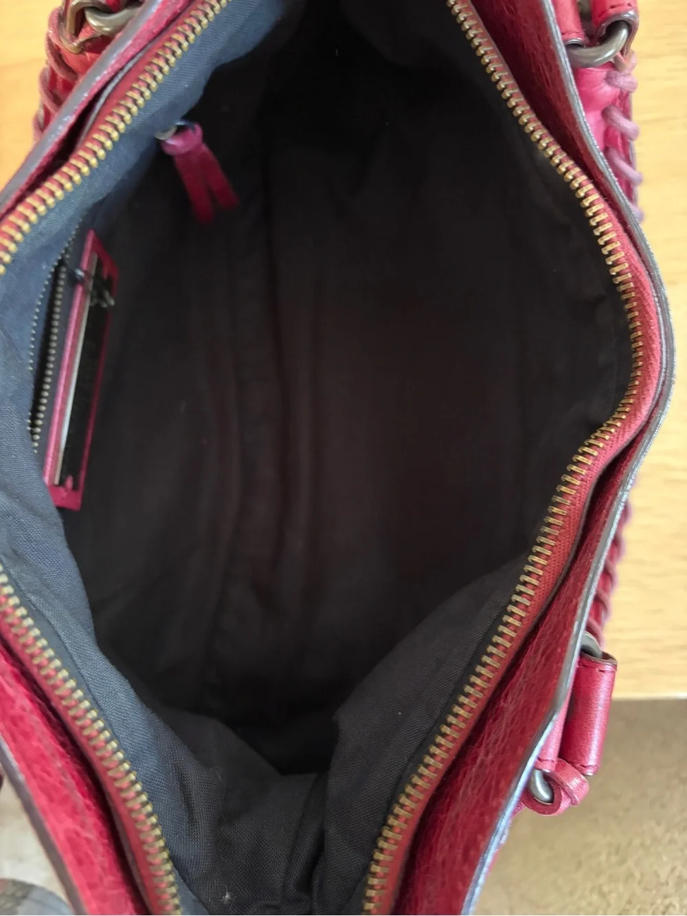 Balenciaga First Bag in Medium Burgundy/Wine color.
